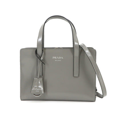 Prada Re-Edition 1995 2-Way Hand Shoulder Bag In Gray Leather