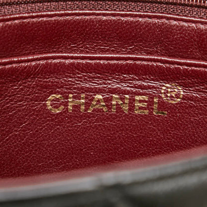 Chanel Matelasse Coco Mark Handbag In Black Lambskin