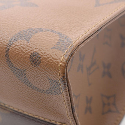 Louis Vuitton On The Go Pm Monogram Giant Reverse Handbag