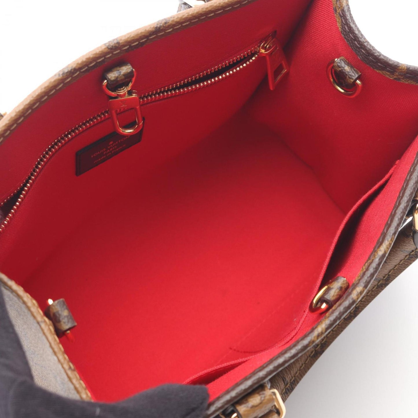 Louis Vuitton On The Go Pm Monogram Giant Reverse Handbag