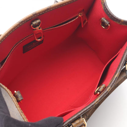 Louis Vuitton On The Go Pm Monogram Giant Reverse Handbag