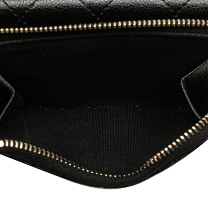 Chanel Matelasse Coco Mark Tri-Fold Wallet In Black Caviar Skin