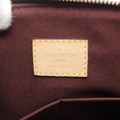 Louis Vuitton Louis Vuitton Rivoli Mm Handbag Coated Canvas Leather Monogram