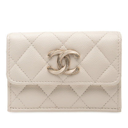 Chanel Matelasse Coco Mark Rhinestone Tri-Fold Wallet In White Caviar Leather
