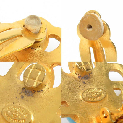 Chanel Coco Mark Metal Stone Earrings In Gold And Blue