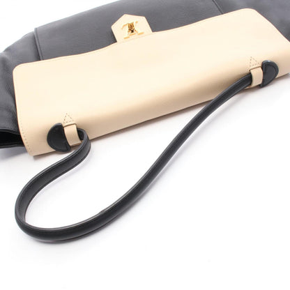 Louis Vuitton Lockme Mm Leather Handbag