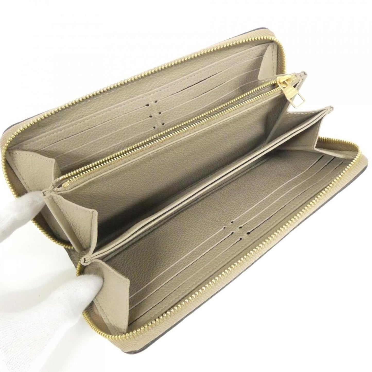 Louis Vuitton Monogram Empreinte Zippy Wallet M69034