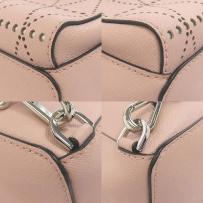 Michael Kors Perforated Backpacks