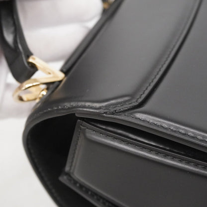 Salvatore Ferragamo Boxy Leather Handbag In Black And Champagne