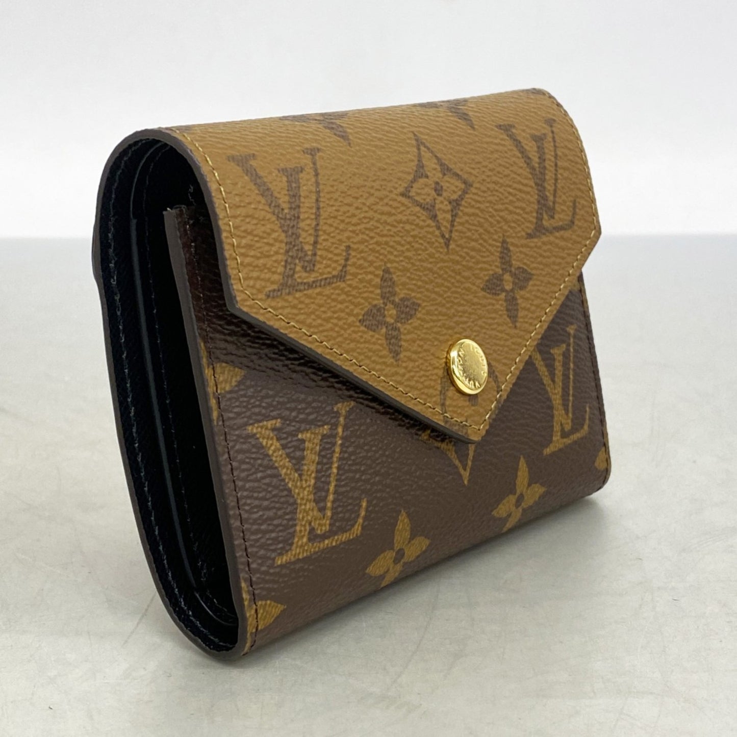 Louis Vuitton Monogram Reverse Portefeuille Victorine Tri-Fold Wallet M81557 Brown