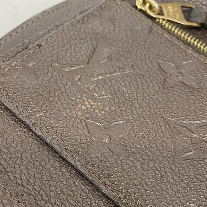 Louis Vuitton Monogram Empreinte Portefeuille Curieuse Tri-Fold Wallet M60543