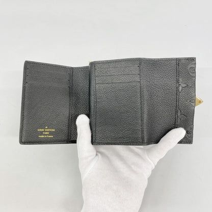 Louis Vuitton Monogram Empreinte Portefeuille Metisse Compact Tri-Fold Wallet M80880 Noir