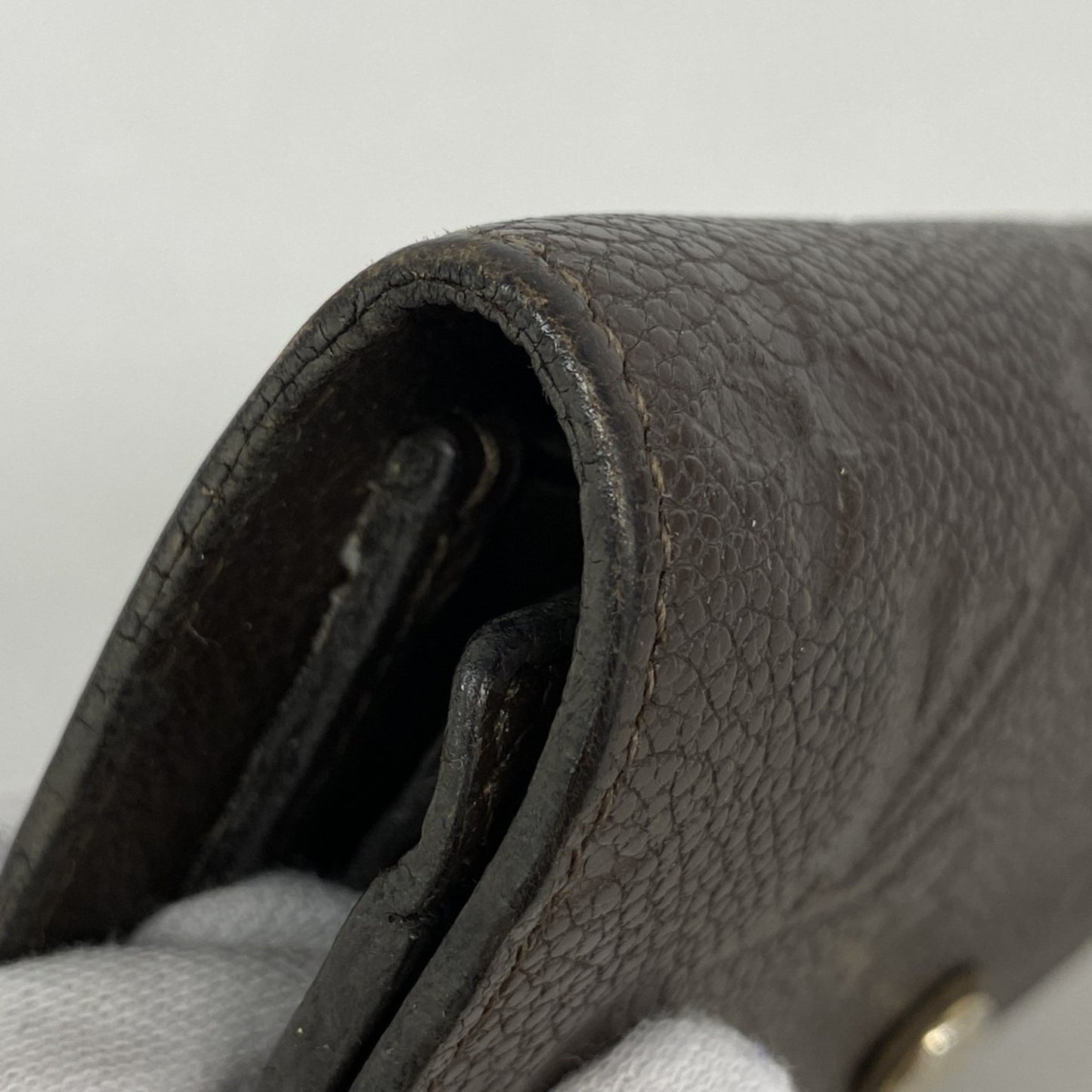 Louis Vuitton Monogram Empreinte Portefeuille Curieuse Tri-Fold Wallet M60543