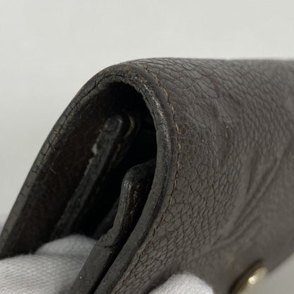 Louis Vuitton Monogram Empreinte Portefeuille Curieuse Tri-Fold Wallet M60543