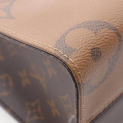 Louis Vuitton On The Go Pm Monogram Giant Reverse Handbag
