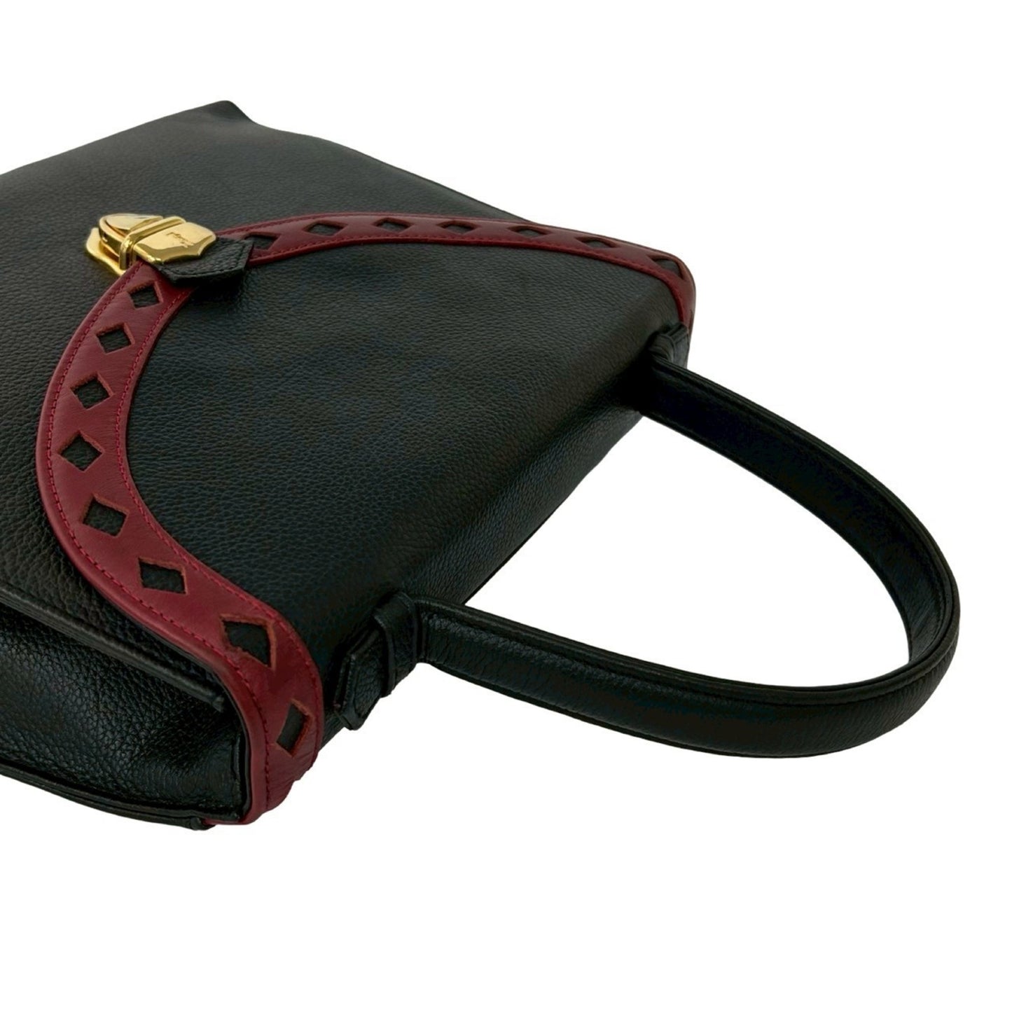 Yves Saint Laurent Ysl Logo Cutout Perforated Leather Handbag In Black