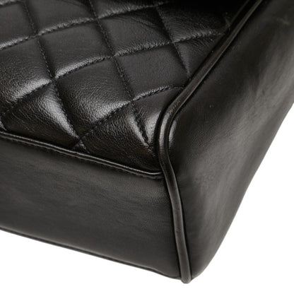 Chanel Matelasse Coco Mark Handbag In Black Lambskin