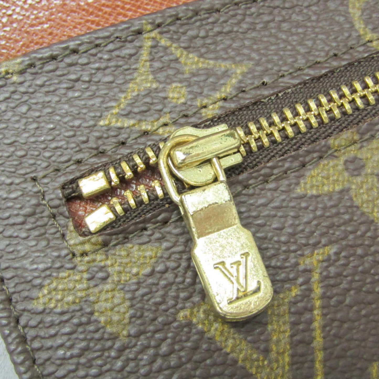 Louis Vuitton Monogram Pochette Lava 23 M51931