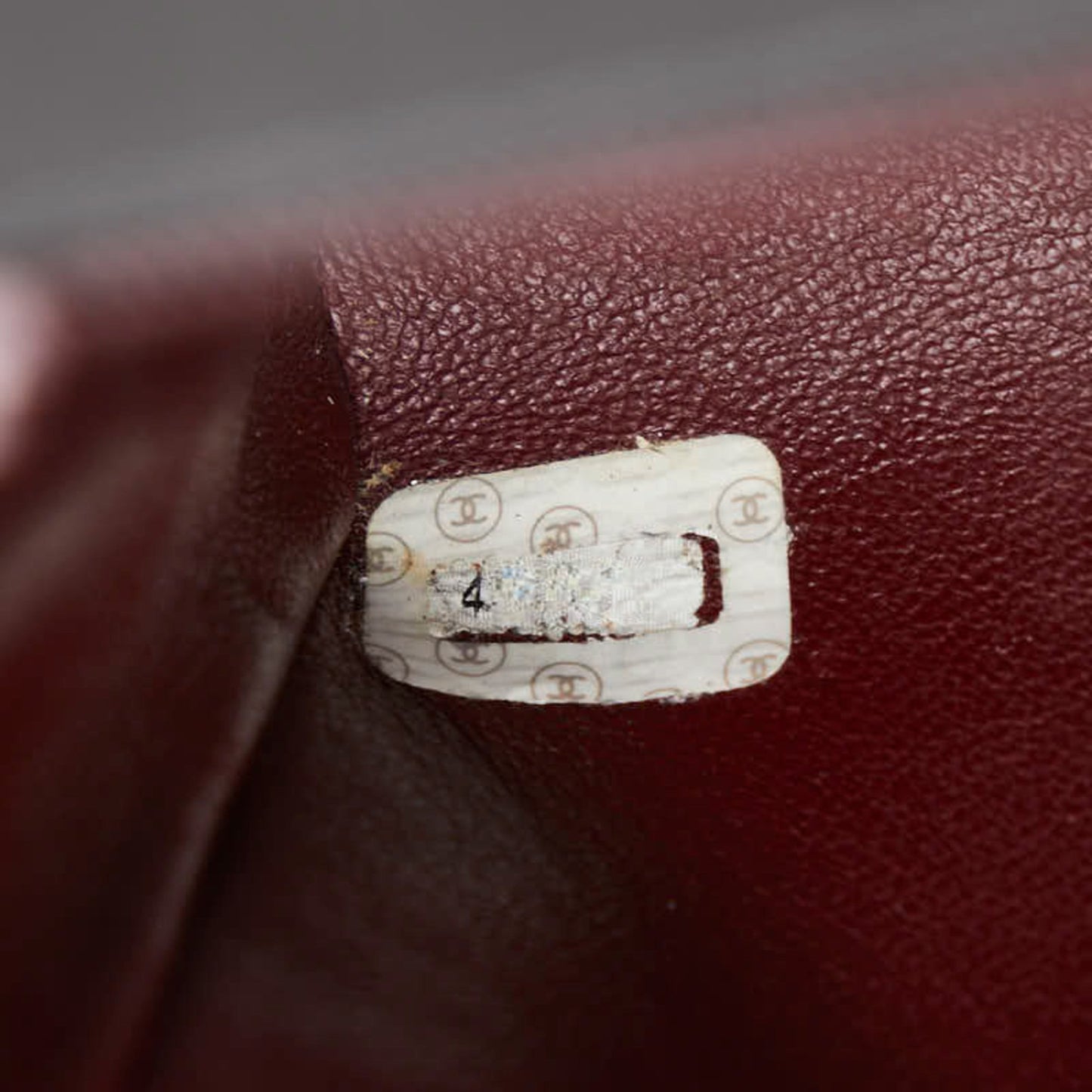 Chanel Matelasse Coco Mark Handbag In Black Lambskin