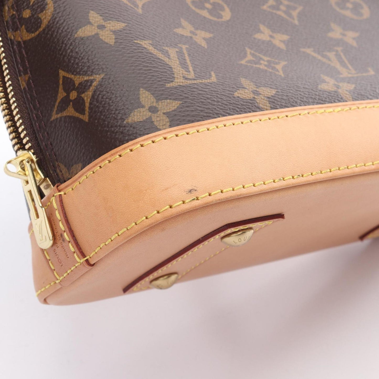 Louis Vuitton Alma Bb Monogram Handbag