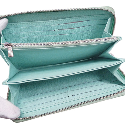 Louis Vuitton Monogram Empreinte Zippy Wallet In Vert D'Or Light Blue (M81466) From The Summer