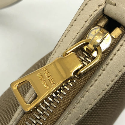 Prada Bt0706 Logo Jacquard Shoulder Bag In Canvas/Leather