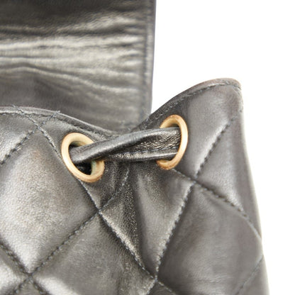 Chanel Matelasse Coco Mark Chain Backpack In Black Lambskin