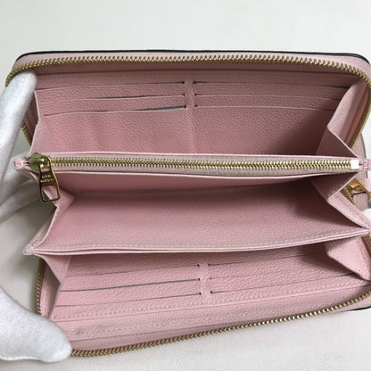 Louis Vuitton M80403 Monogram Empreinte By The Pool Zippy Wallet