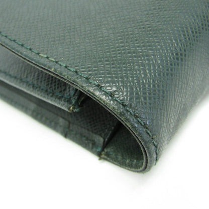 Louis Vuitton Taiga Serviette Kourad M30074