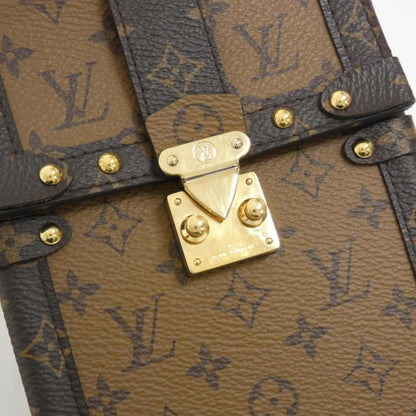 Louis Vuitton Monogram Reverse Pochette Trunk Vertical M67873 Handbag
