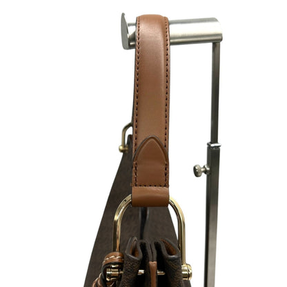 Michael Kors One-Shoulder Hobo Bag With Signature Mk Logo Charm In Brown Leather