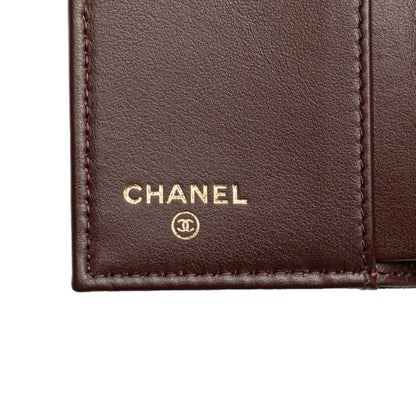 Chanel Matelasse Coco Mark Tri-Fold Wallet In Black Caviar Skin