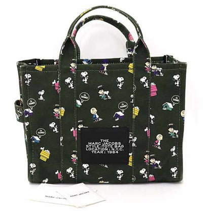 Marc Jacobs X Peanuts Collaboration: The Tote Canvas Tote Bag In Khaki Green.