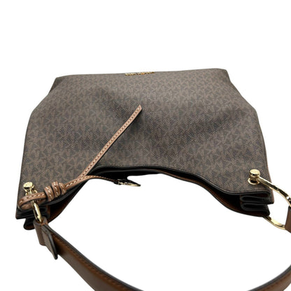 Michael Kors One-Shoulder Hobo Bag With Signature Mk Logo Charm In Brown Leather