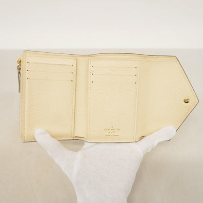 Louis Vuitton Monogram Empreinte Bicolor Tri-Fold Wallet Portefeuille Victorine M80086 Crme Bois De