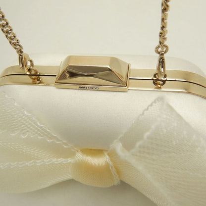 Satin clutch bag by Jimmy Choo