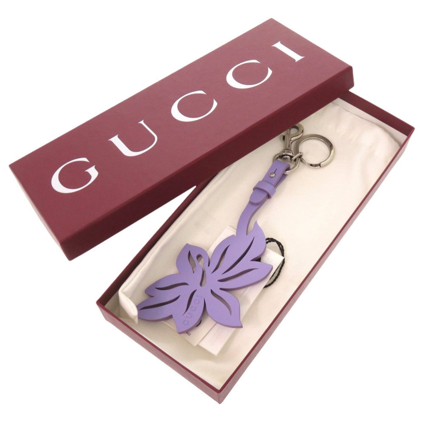 Metal leather key chain by Gucci