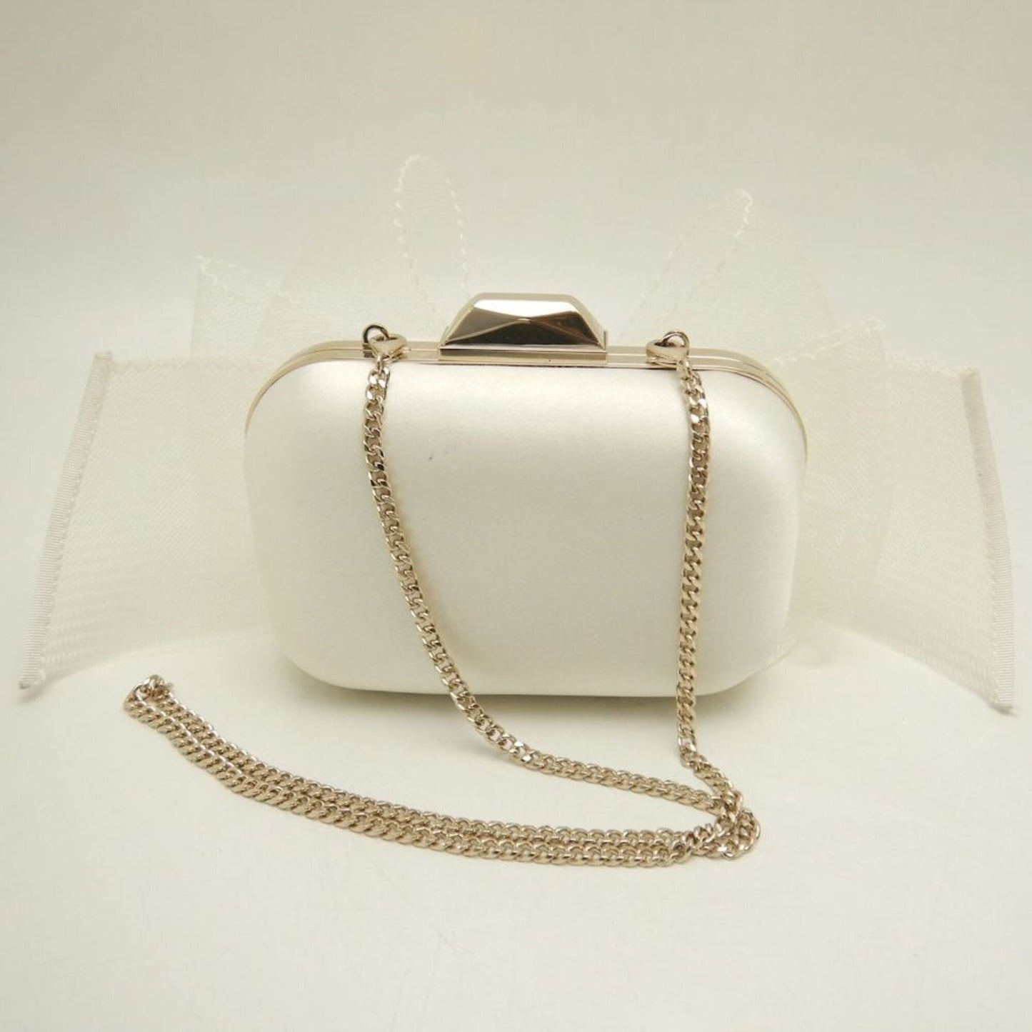 Satin clutch bag by Jimmy Choo