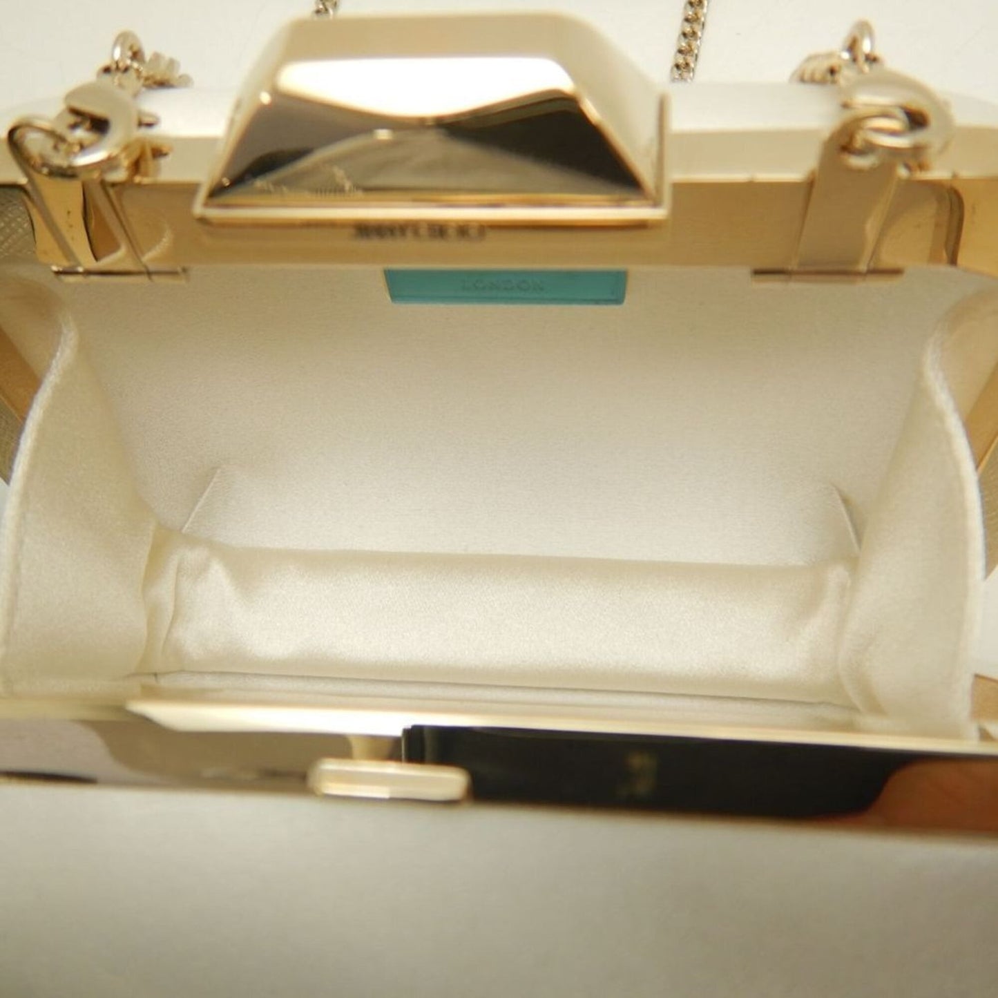 Satin clutch bag by Jimmy Choo