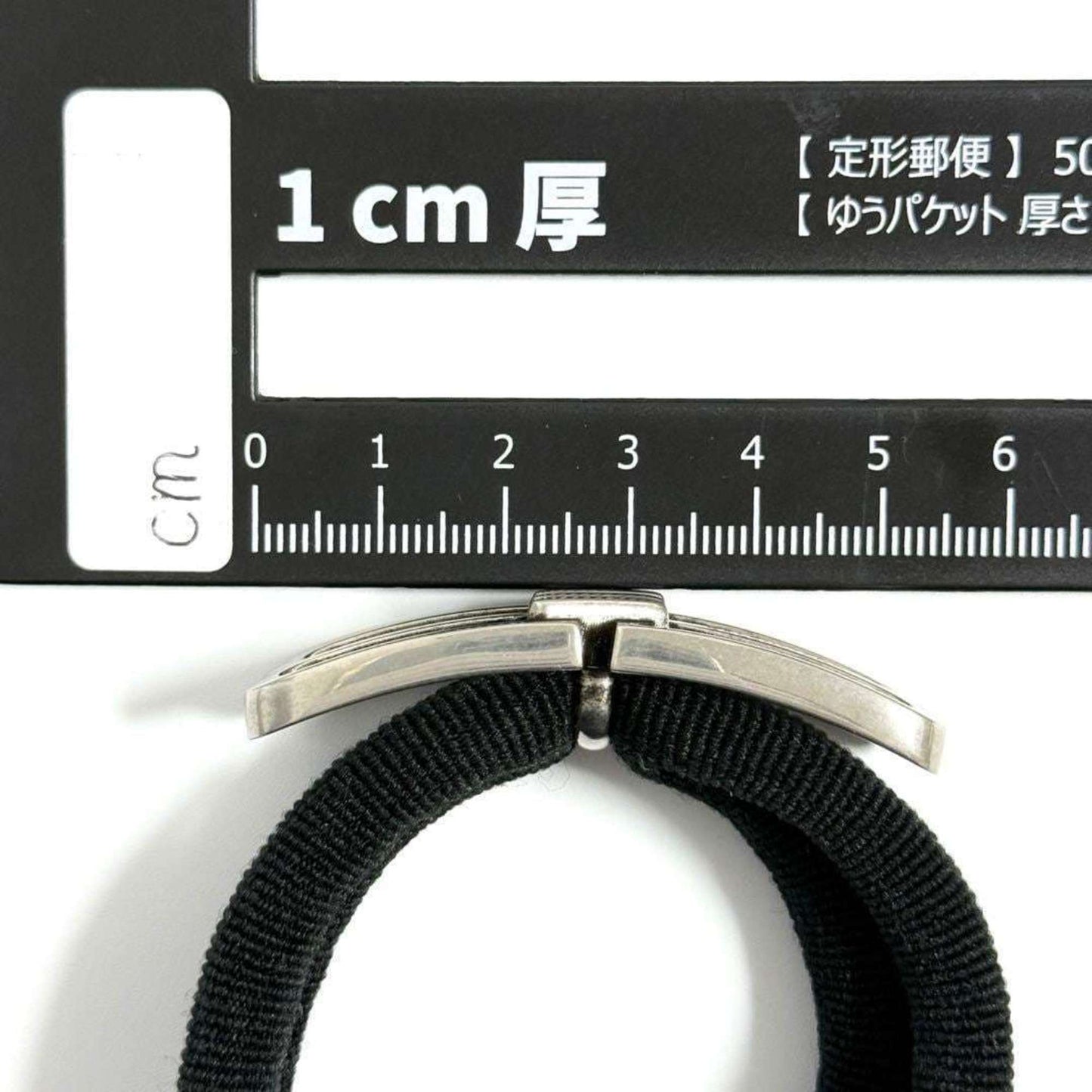 Metal hair tie by Balenciaga