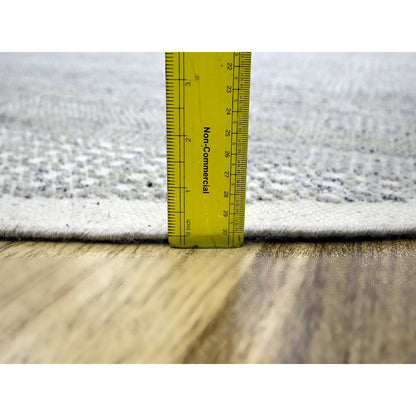 Hand knotted wool rug round oxidized distressed grass design gray