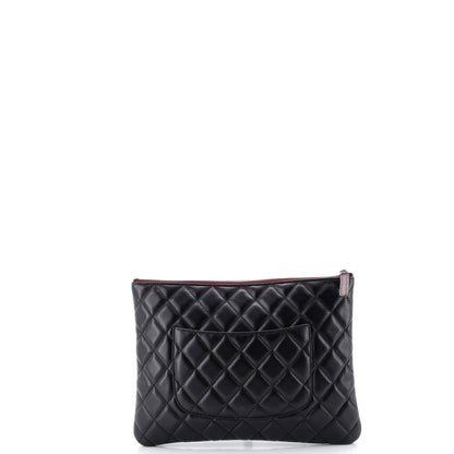 Chanel O Case Clutch Quilted Lambskin Medium