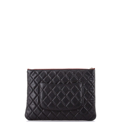 Chanel O Case Clutch Quilted Lambskin Medium