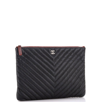 Chanel O Case Clutch Chevron Caviar Medium