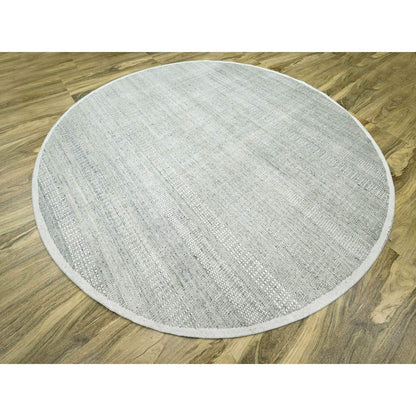 Hand knotted wool rug round oxidized distressed grass design gray