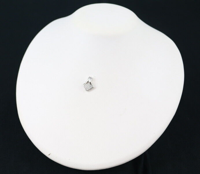 Diamond 0.60Ct Mystery-Setting Pendant 18K 750