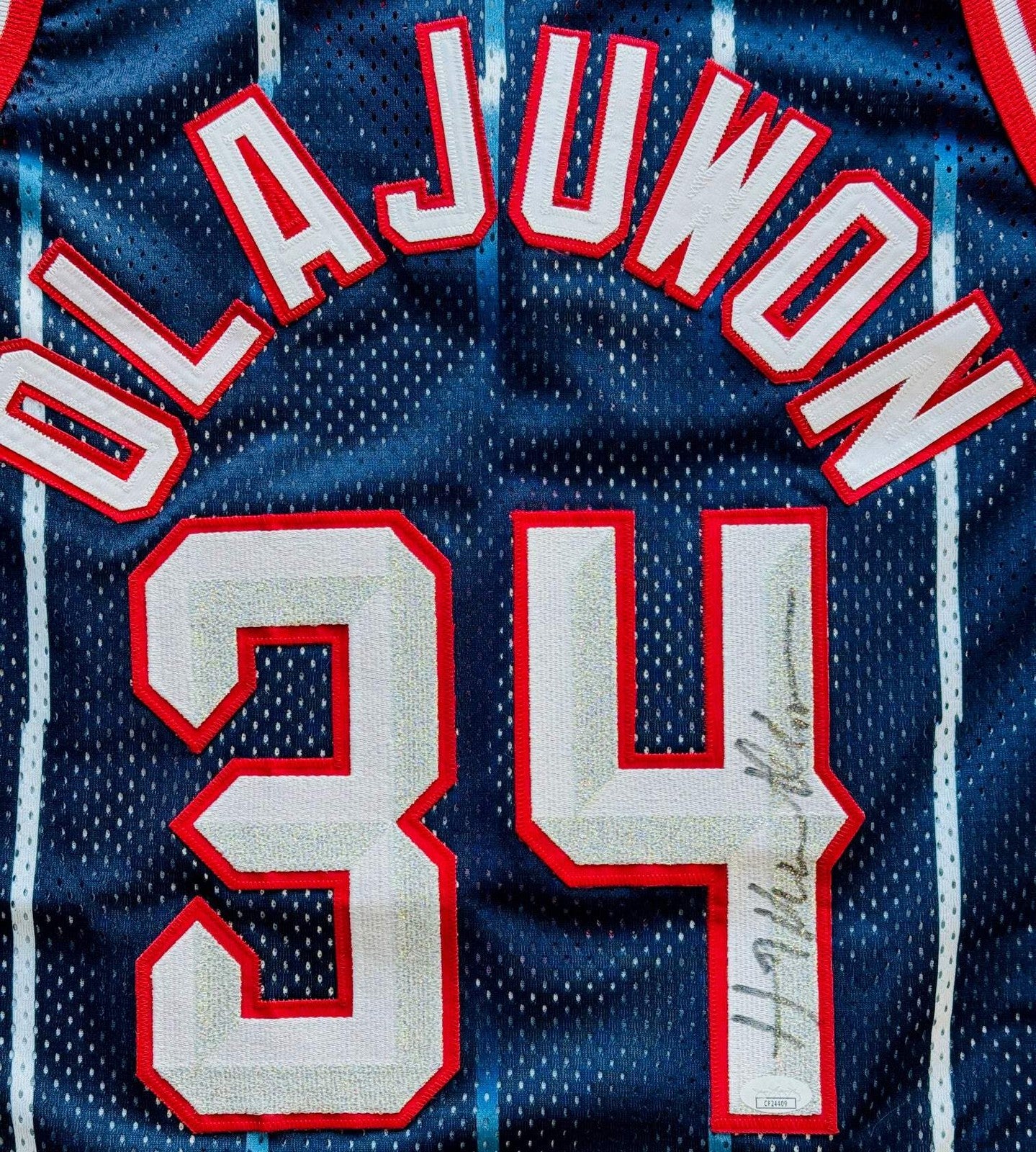 Hakeem Olajuwon Autographed Rockets Authentic Champion Jersey (Jsa)