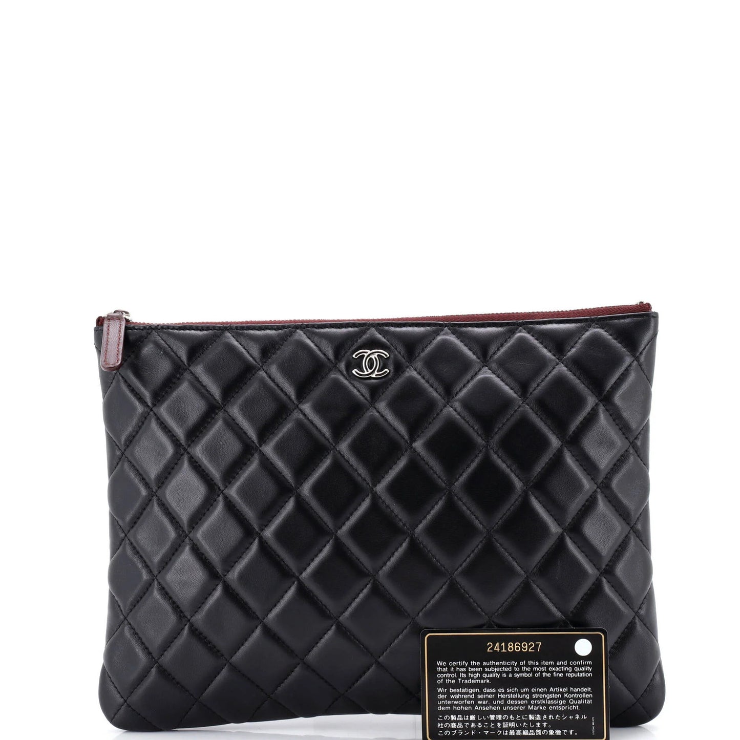 Chanel O Case Clutch Quilted Lambskin Medium