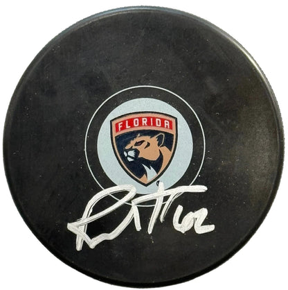 Brandon Montour Autographed Panthers Logo Puck (Jsa)
