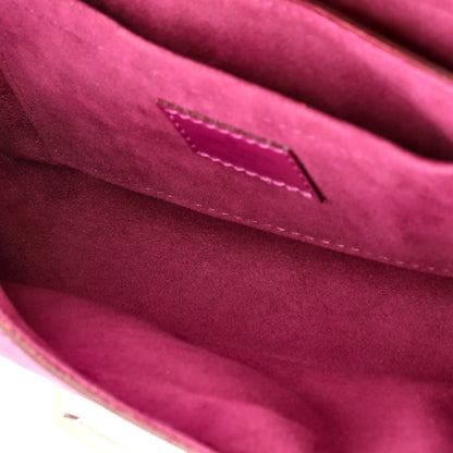 Louis Vuitton Montaigne Clutch Epi Leather